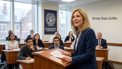 Anne Dias Griffin speaking at a podium while teaching a finance class at Georgetown University.